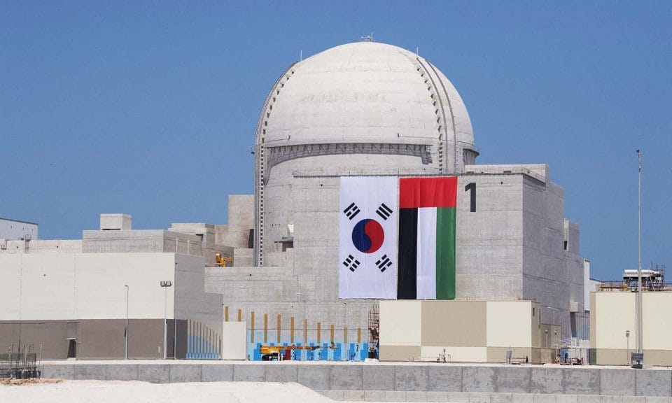 The Barakah nuclear power plant with Korean and UAE flags.