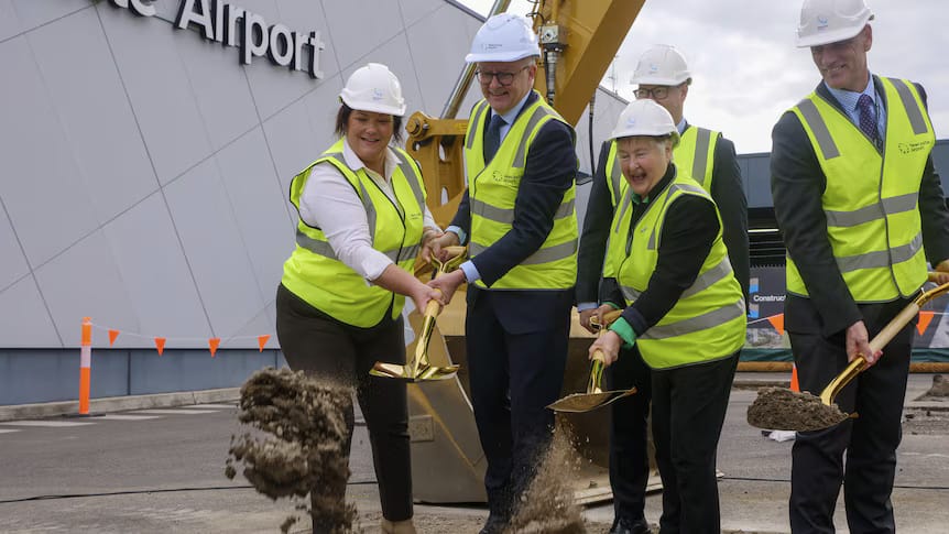 Anthony Albanese shovelling dirt.