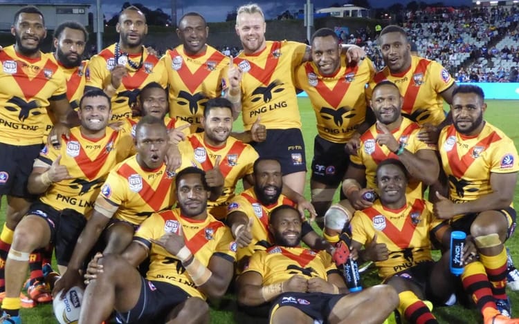 A happy looking PNG rugby league side.