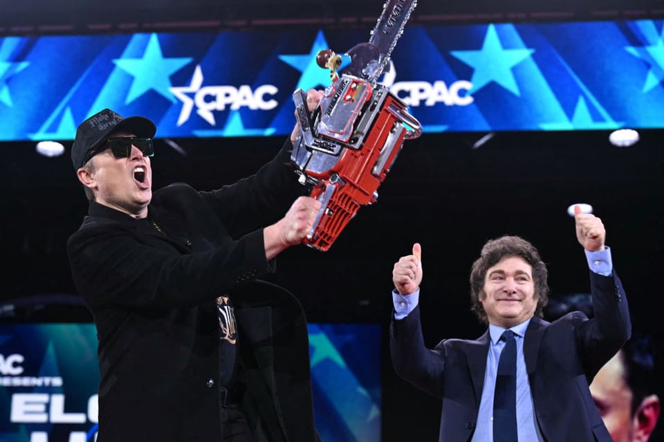 Elon Musk weilding a chainsaw gifted to him by Xvier Milei.